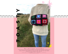 Load image into Gallery viewer, Toasty - a granny square hand cosy
