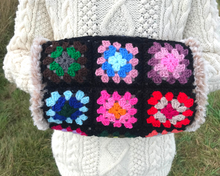 Load image into Gallery viewer, Toasty - a granny square hand cosy
