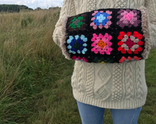 Load image into Gallery viewer, Toasty - a granny square hand cosy
