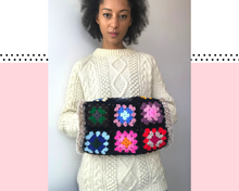 Load image into Gallery viewer, Toasty - a granny square hand cosy
